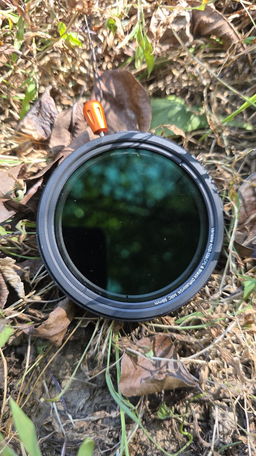 A K&F Concept variable ND filter on dry leaves.