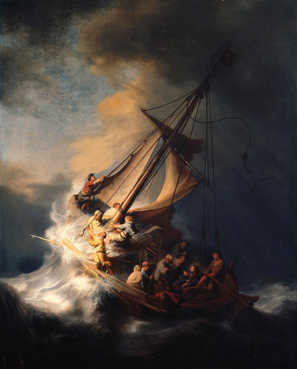 Rembrandt's Christ in the Storm on the Sea of Galilee: a small fishing boat heeling over on a huge dark wave, its sail torn, disciples struggling with ropes while Christ sits calmly in the stern, with light breaking through storm clouds above.