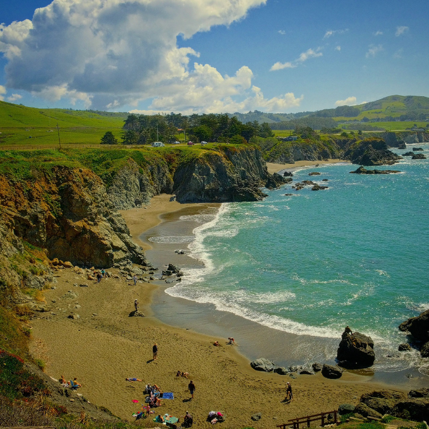 Coastal bluff, rocky shoreline, and Pacific surf at Duncan's Landing in Sonoma Coast State Park, California.