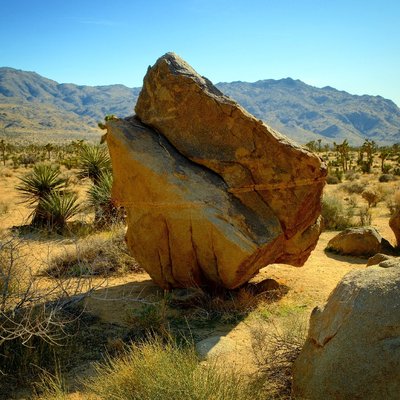 Massive quartz monzogranite boulder formation with desert varnish at Joshua Tree National Park, California